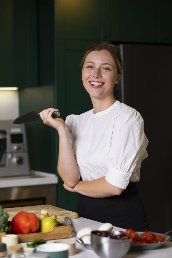 medium shot smiley woman kitchen